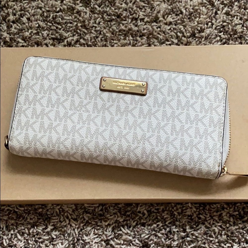 MK jet set signature travel continental wallet